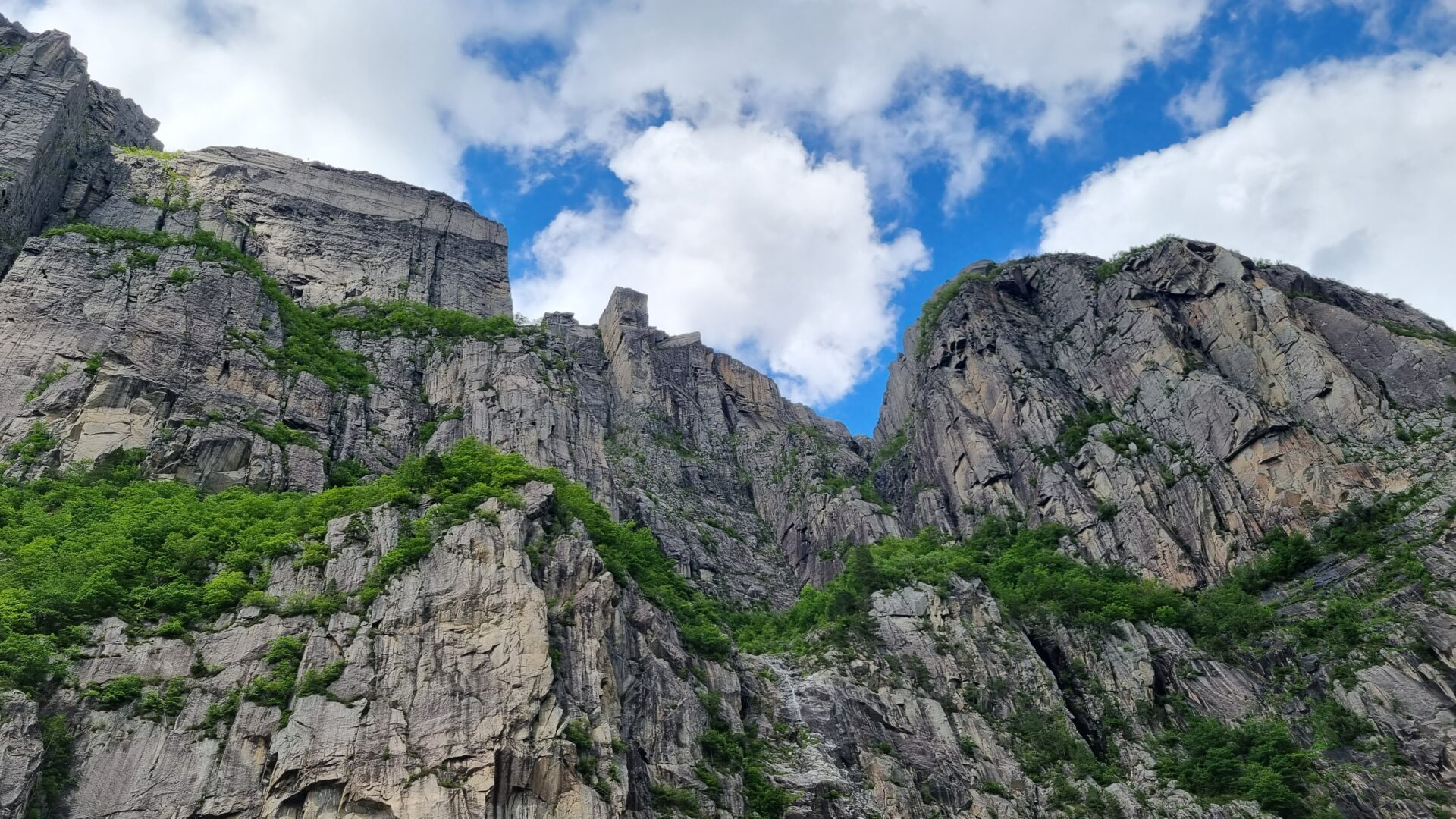Preikestolen spottet from the sea side, climbing 604 meters above the sea level.