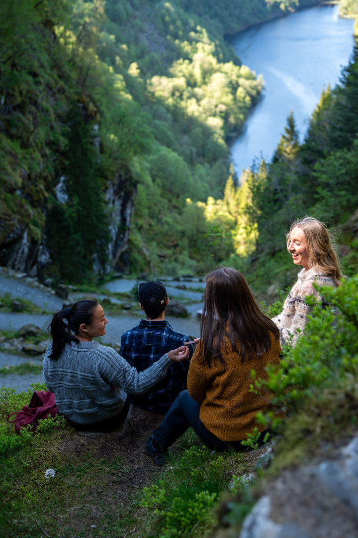 a short break during Kossdalssvingane hike with scenic views at the top of the hairpin turns.