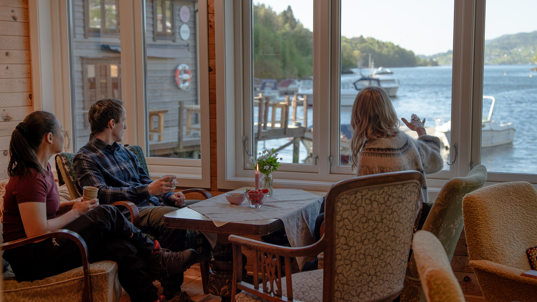 A coffee brake afer lunch at Den grøne fabrikken in Hosanger. A small group enjoying the fjord views.
