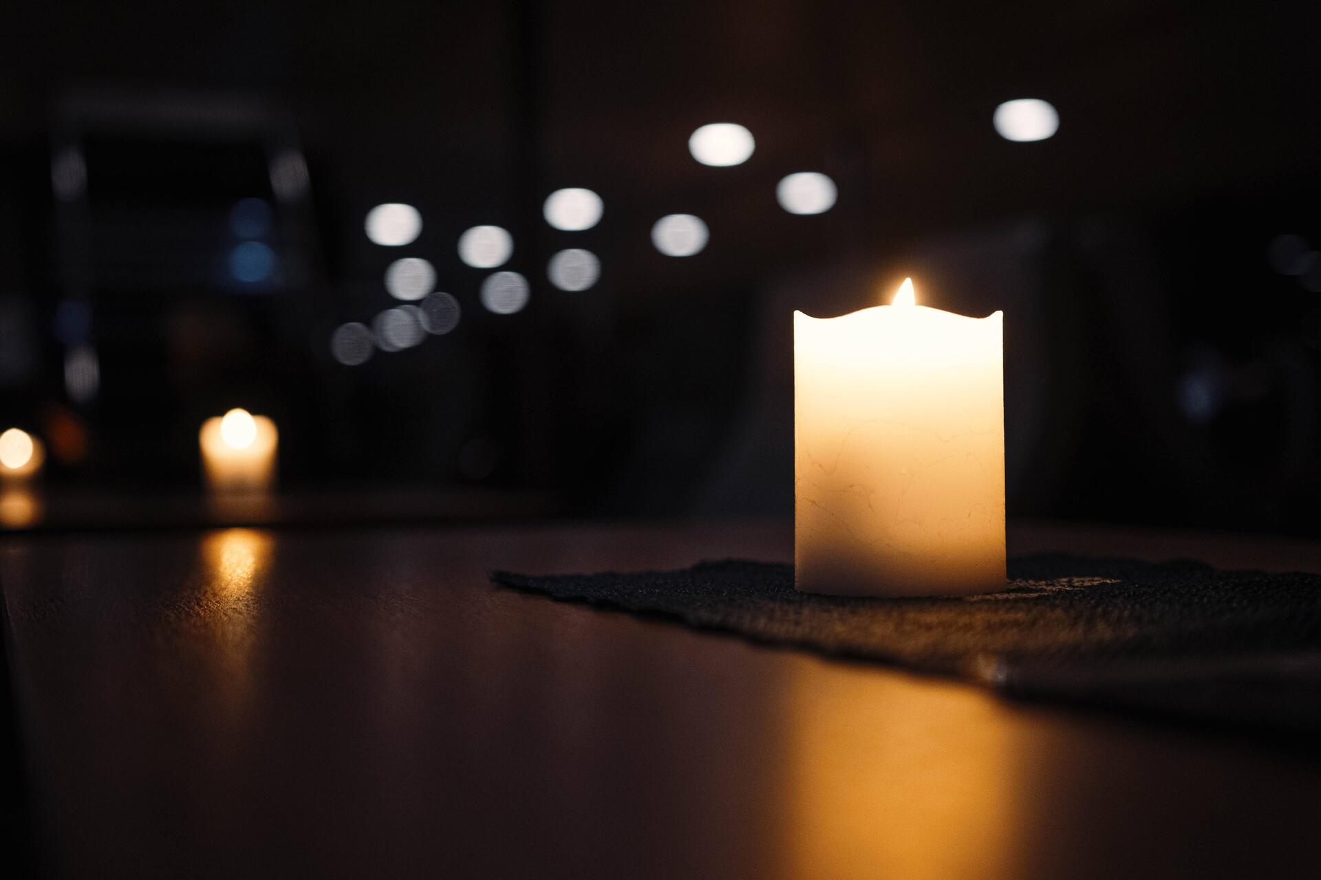 Soft LED lights on tables inside the boat during an evening Northern Lights cruise, creating a warm and relaxed atmosphere.
